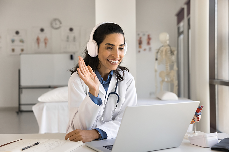 Clinician reviewing digital dashboard